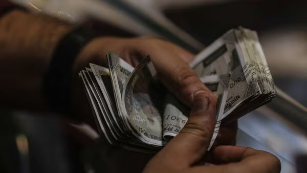 Indian Rupee Falls to Fresh Record Low Amid Strong US Dollar Demand